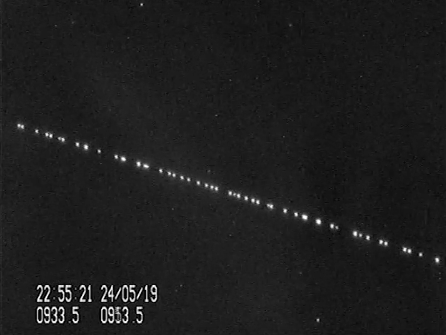 String of Pearls: A train of SpaceX Starlink satellites is seen in the night sky in this still from a video captured by satellite tracker Marco Langbroek in Leiden, the Netherlands on May 24, 2019, just one day after SpaceX launched its first 60-satellite batch of Starlink internet communications satellites into orbit.